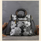 <tc>Black Retro Flowers Embossed Leather Tote Bags</tc>