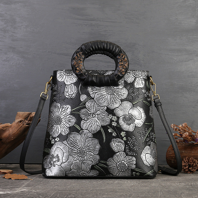 <tc>Black Retro Flowers Embossed Leather Tote Bags</tc>