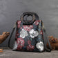 <tc>Black and Red Retro Flowers Embossed Leather Tote Bags</tc>