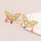 golden hollow butterfly pendant earrings