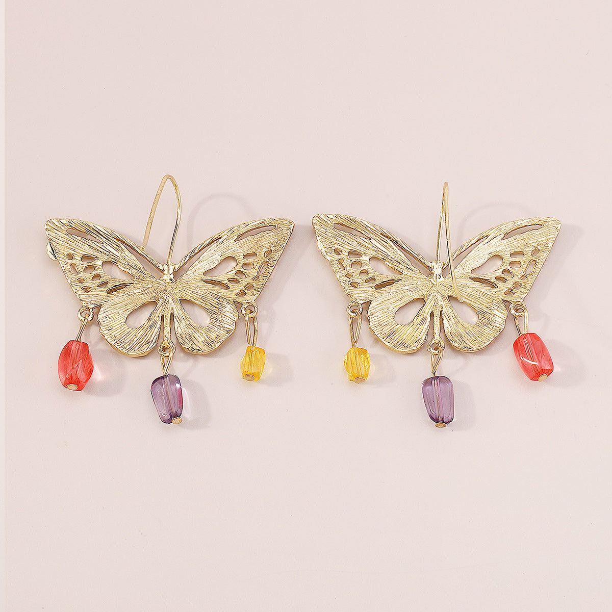 golden hollow butterfly pendant earrings