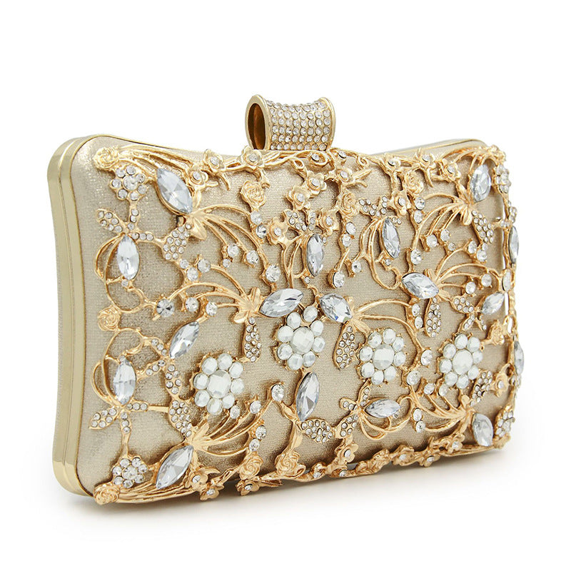 Floral party clutch bag decorated with silver and golden rhinestones