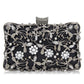 Floral party clutch bag decorated with silver and golden rhinestones