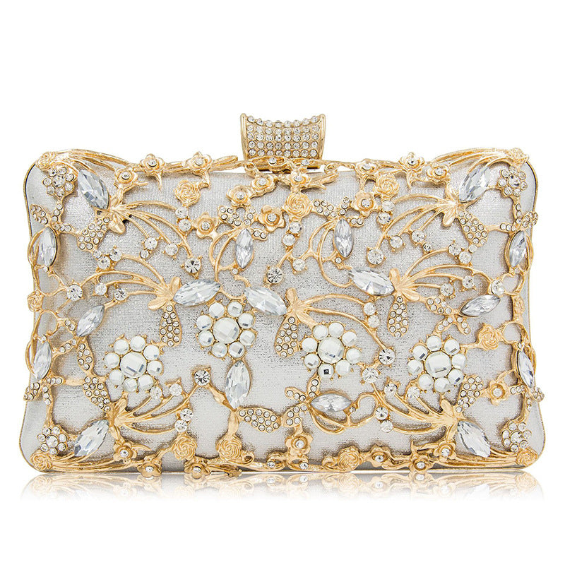 Floral party clutch bag decorated with silver and golden rhinestones