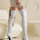 Over-the-knee boots with pointed toe stiletto heels and silver glitter