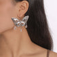 Silver hollow-out butterfly pendant earrings