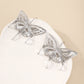 Silver hollow-out butterfly pendant earrings