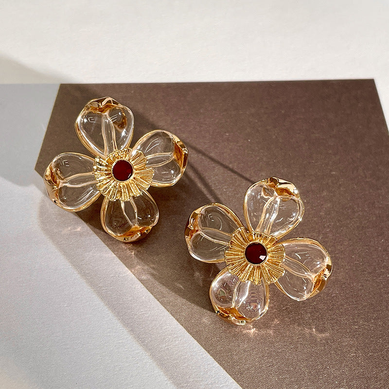 Transparent three-dimensional four-leaf flower stud earrings