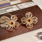 Transparent three-dimensional four-leaf flower stud earrings