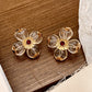 Transparent three-dimensional four-leaf flower stud earrings