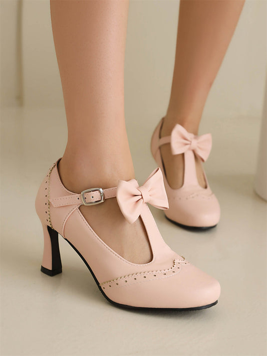 Vintage Pink Spool Heel Bow T-Strap Heel Pumps