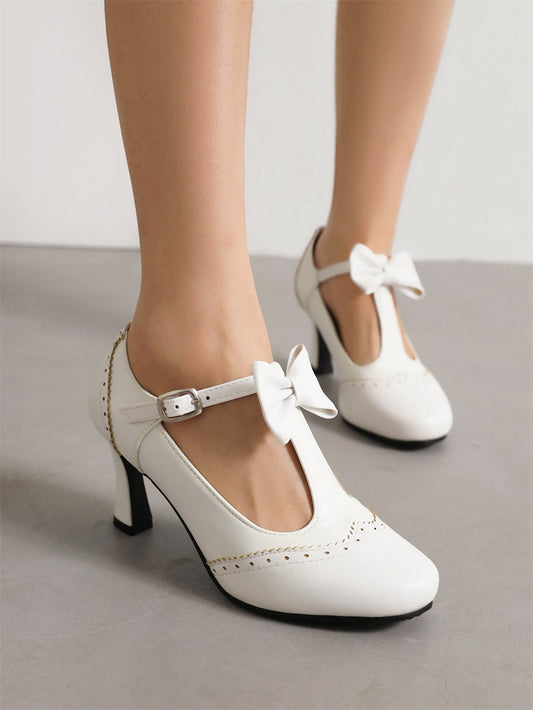 Vintage White Spool Heel Bow T-Strap Heel Pumps