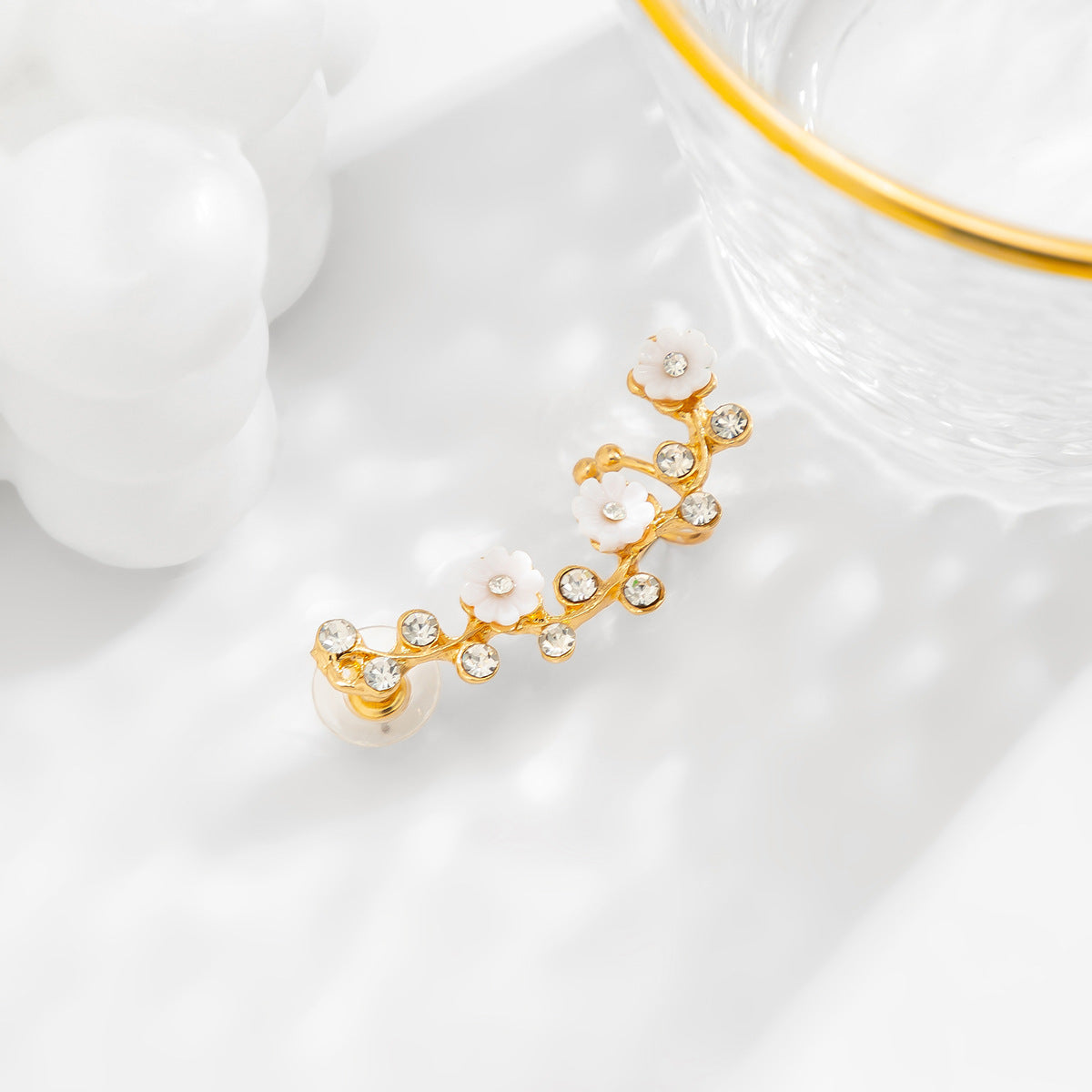 golden rhinestone flower ear studs